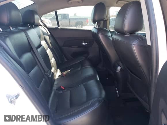 2015 Chevrolet Cruze LT with VIN 1G1PE5SB9F7250650, listed as a Copart auction lot 82333875 with 138,492 mi miles and Salvage title. Bid and sale history available at DreamBid. Image 10.