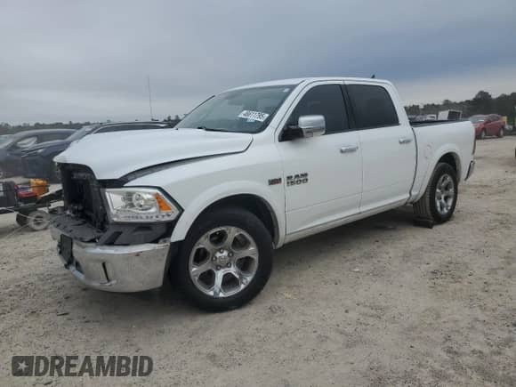 2013 Ram 1500 Laramie with VIN 1C6RR6NT0DS566115, listed as a Copart auction lot 46611795 with 201,942 mi miles and Salvage title. Bid and sale history available at DreamBid. Image 1.