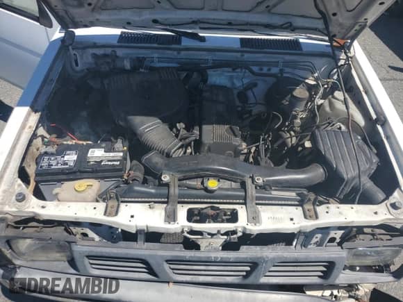 1994 Nissan Frontier с VIN 1N6SD11S7RC414811, выставлен на аукционе Copart как лот 65633535 с пробегом 234 730 миль миль и Списание • Salvage title. История ставок и продаж доступна на DreamBid. Изображение 11.