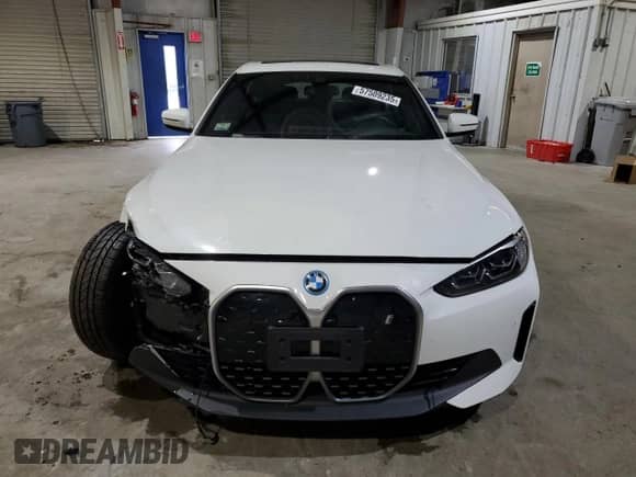 2022 BMW i4 eDrive40 с VIN WBY73AW0XNFM42502, выставлен на аукционе Copart как лот 57509235 с пробегом 25 001 миль миль и Списание • Salvage title. История ставок и продаж доступна на DreamBid. Изображение 5.