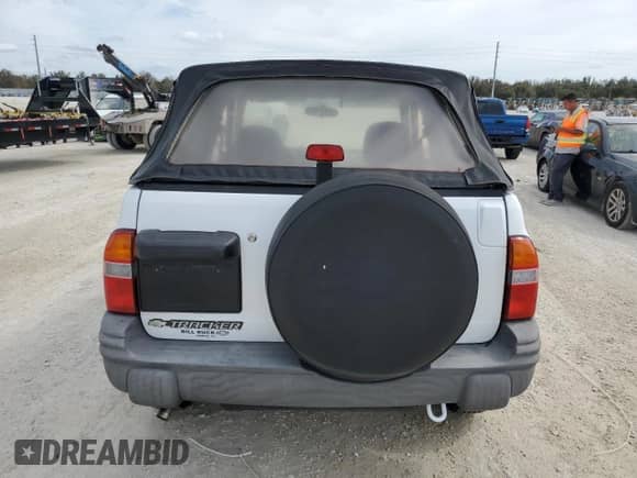 2001 Chevrolet Tracker с VIN 2CNBJ18C216900249, выставлен на аукционе Copart как лот 77476204 с пробегом Не указан миль и Списание • Salvage title. История ставок и продаж доступна на DreamBid. Изображение 6.