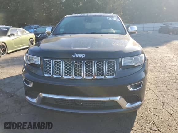 2014 Jeep Grand Cherokee Summit with VIN 1C4RJFJT4EC355145, listed as a Copart auction lot 87177185 with 320,055 mi miles and Clean title. Bid and sale history available at DreamBid. Image 5.