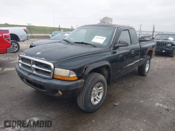 2001 Dodge Dakota Sport z VIN 1B7GG22N81S212519, wystawiony jako IAAI lot #43557080 z przebiegiem 150 028 mil mil oraz . Historia ofert i sprzedaży dostępna na DreamBid. Obrazek 2.