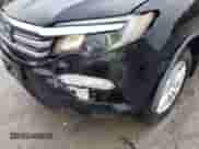 2016 Honda Pilot LX z VIN 5FNYF6H17GB040315, wystawiony jako IAAI lot #43402665 z przebiegiem 167 922 mil mil oraz . Historia ofert i sprzedaży dostępna na DreamBid. Obrazek 6.