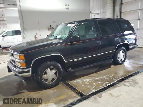 1999 Chevrolet Tahoe Z71 с VIN 1GNEK13R9XR100174, выставлен на аукционе Copart как лот 72024635 с пробегом 195 978 миль миль и Списание • Salvage title. История ставок и продаж доступна на DreamBid. Изображение 1.