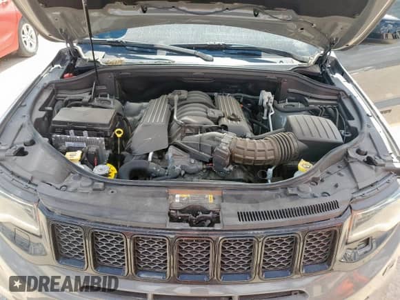 2021 Jeep Grand Cherokee SRT with VIN 1C4RJFDJ9MC822231, listed as a Copart auction lot 65502285 with 58,441 mi miles and Salvage title. Bid and sale history available at DreamBid. Image 12.