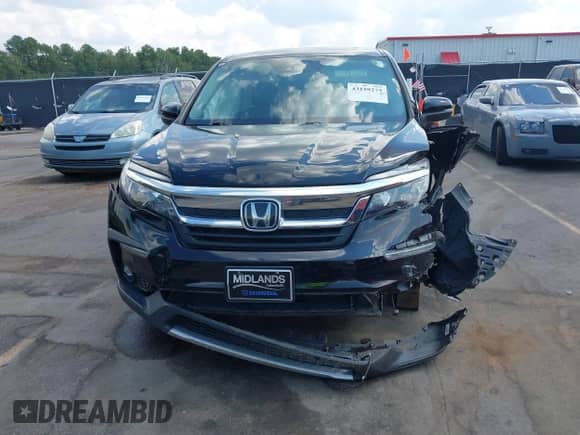 2021 Honda Pilot EX-L с VIN 5FNYF6H57MB100639, выставлен на аукционе IAAI как лот 43159275 с пробегом 88 114 миль миль и . История ставок и продаж доступна на DreamBid. Изображение 13.