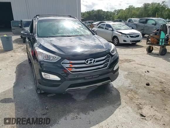 2015 Hyundai Santa Fe с VIN 5XYZU3LB3FG288951, выставлен на аукционе Copart как лот 85191935 с пробегом 118 872 миль миль и Списание • Salvage title. История ставок и продаж доступна на DreamBid. Изображение 14.