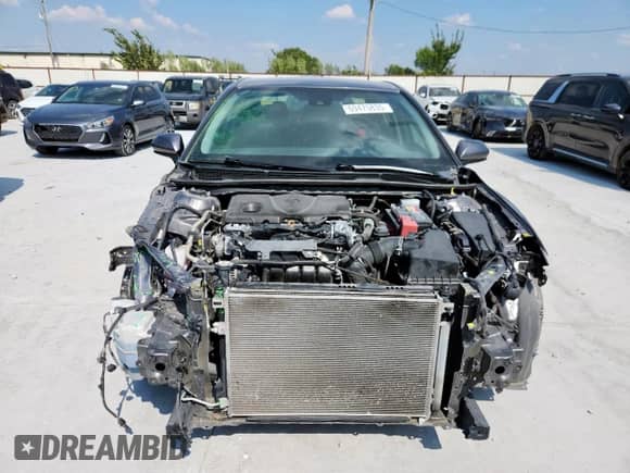 2019 Toyota Camry LE с VIN 4T1B11HK7KU815143, выставлен на аукционе Copart как лот 69475835 с пробегом 122 992 миль миль и Списание • Salvage title. История ставок и продаж доступна на DreamBid. Изображение 5.