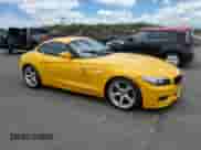 2012 BMW Z4 sDrive28i with VIN WBALL5C57CE716617, listed as a Copart auction lot 61099305 with 76,995 mi miles and Salvage title. Bid and sale history available at DreamBid. Image 4.