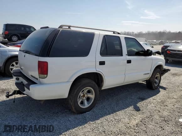 2003 Chevrolet Blazer LS с VIN 1GNCS13X43K162199, выставлен на аукционе Copart как лот 49215295 с пробегом Не указан миль и Списание • Salvage title. История ставок и продаж доступна на DreamBid. Изображение 3.