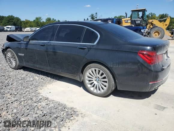 2013 BMW 7 Series 740Li with VIN WBAYE4C54DDW22762, listed as a Copart auction lot 70366125 with 113,536 mi miles and Salvage title. Bid and sale history available at DreamBid. Image 2.