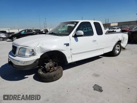 2003 Ford F-150 XL z VIN 2FTRX17L63CB07124, wystawiony jako Copart lot #86682935 z przebiegiem 101 788 mil mil oraz Szkoda całkowita • Salvage title. Historia ofert i sprzedaży dostępna na DreamBid. Obrazek 1.