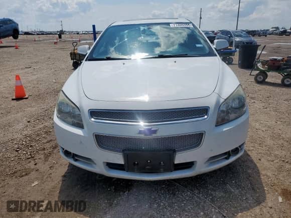2012 Chevrolet Malibu LTZ z VIN 1G1ZG5E72CF286630, wystawiony jako Copart lot #71409355 z przebiegiem 124 448 mil mil oraz Szkoda całkowita • Salvage title. Historia ofert i sprzedaży dostępna na DreamBid. Obrazek 5.