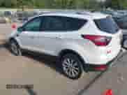 2017 Ford Escape Titanium z VIN 1FMCU9J97HUD36618, wystawiony jako IAAI lot #43216660 z przebiegiem 150 371 mil mil oraz . Historia ofert i sprzedaży dostępna na DreamBid. Obrazek 3.