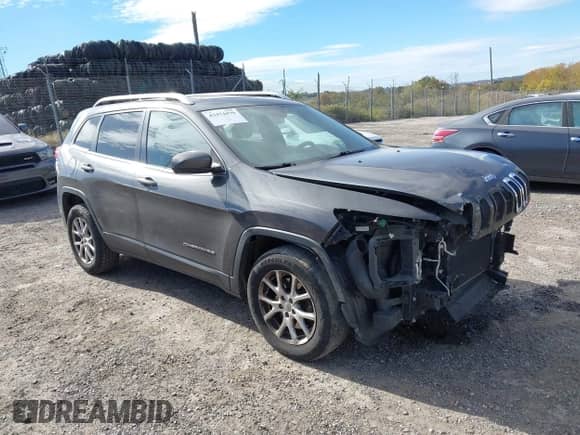2014 Jeep Cherokee Latitude with VIN 1C4PJMCS8EW215288, listed as a IAAI auction lot 43474479 with 152,623 mi miles and . Bid and sale history available at DreamBid. Image 1.