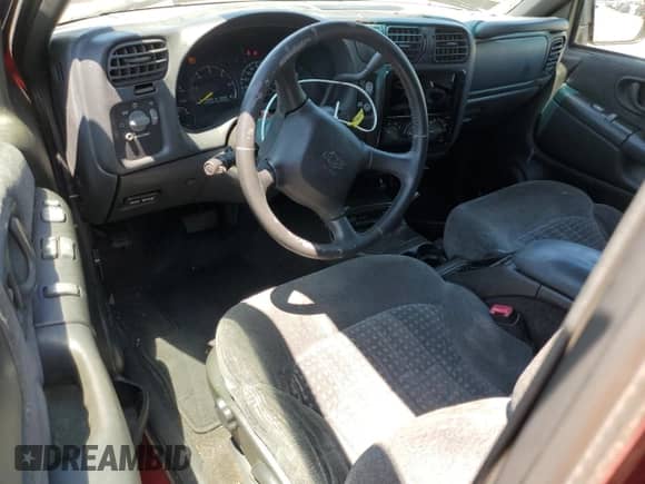 2000 Chevrolet Blazer LS with VIN 1GNCS18W6YK138400, listed as a Copart auction lot 60550575 with 166,872 mi miles and Salvage title. Bid and sale history available at DreamBid. Image 8.