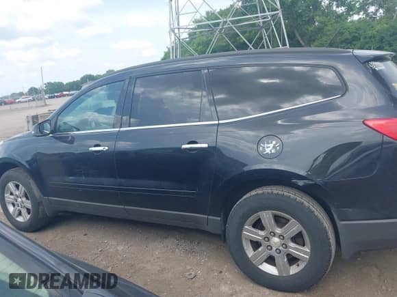 2012 Chevrolet Traverse 2LT z VIN 1GNKRJED8CJ354001, wystawiony jako IAAI lot #42558951 z przebiegiem 293 472 mil mil oraz . Historia ofert i sprzedaży dostępna na DreamBid. Obrazek 15.