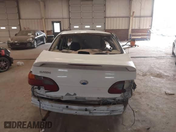 2004 Chevrolet Malibu Classic z VIN 1G1ND52F04M699548, wystawiony jako IAAI lot #41358609 z przebiegiem Nie podano mil oraz . Historia ofert i sprzedaży dostępna na DreamBid. Obrazek 16.