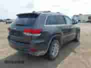 2020 Jeep Grand Cherokee Laredo E with VIN 1C4RJEAG2LC284912, listed as a IAAI auction lot 42114881 with 86,579 mi miles and . Bid and sale history available at DreamBid. Image 4.