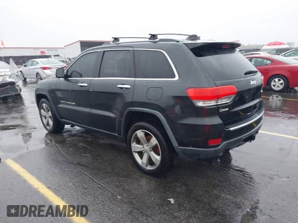 2014 Jeep Grand Cherokee Limited z VIN 1C4RJEBG3EC107836, wystawiony jako IAAI lot #43531249 z przebiegiem 198 795 mil mil oraz . Historia ofert i sprzedaży dostępna na DreamBid. Obrazek 3.