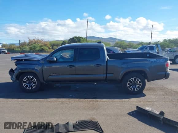 2020 Toyota Tacoma SR5 with VIN 3TMDZ5BNXLM084553, listed as a IAAI auction lot 42556448 with 74,634 mi miles and . Bid and sale history available at DreamBid. Image 15.