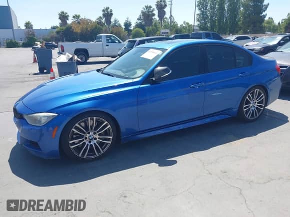 2013 BMW 3 Series 335i with VIN WBA3A9G53DNP36811, listed as a IAAI auction lot 42558641 with 122,566 mi miles and . Bid and sale history available at DreamBid. Image 2.