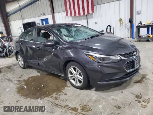 2017 Chevrolet Cruze LT с VIN 1G1BE5SM7H7131865, выставлен на аукционе Copart как лот 85877425 с пробегом 144 207 миль миль и Списание • Salvage title. История ставок и продаж доступна на DreamBid. Изображение 4.