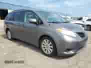 2014 Toyota Sienna LE with VIN 5TDJK3DC1ES090493, listed as a Copart auction lot 68778275 with 227,227 mi miles and Clean title. Bid and sale history available at DreamBid. Image 4.