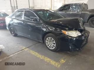 2012 Toyota Camry LE with VIN 4T1BD1FK0CU057450, listed as a IAAI auction lot 43189487 with 230,986 mi miles and . Bid and sale history available at DreamBid. Image 1.