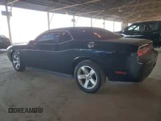 2014 Dodge Challenger SXT z VIN 2C3CDYAG5EH110982, wystawiony jako Copart lot #85419705 z przebiegiem 144 893 mil mil oraz Czysty tytuł • Clean title. Historia ofert i sprzedaży dostępna na DreamBid. Obrazek 2.