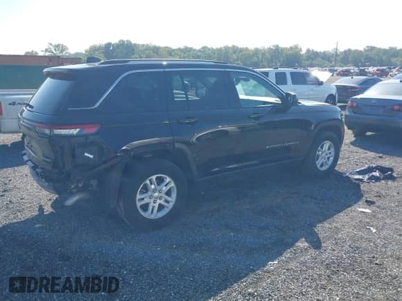 2023 Jeep Grand Cherokee Laredo with VIN 1C4RJHAG4PC528325, listed as a IAAI auction lot 43183978 with 45,945 mi miles and . Bid and sale history available at DreamBid. Image 4.