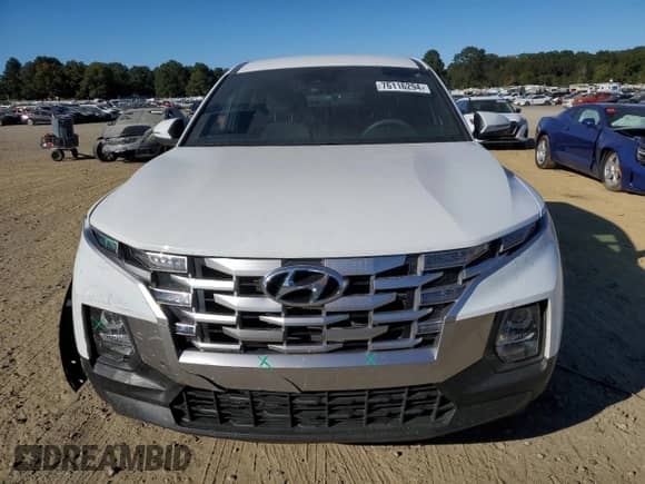 2022 Hyundai Santa Cruz SEL с VIN 5NTJB4AE2NH025378, выставлен на аукционе Copart как лот 76116294 с пробегом 41 206 миль миль и Списание • Salvage title. История ставок и продаж доступна на DreamBid. Изображение 5.