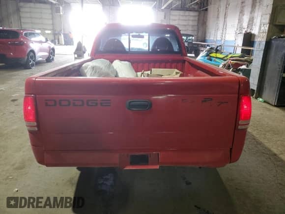 1999 Dodge Dakota SLT with VIN 1B7GL26Z4XS233613, listed as a Copart auction lot 89320955 with 221,289 mi miles and Clean title. Bid and sale history available at DreamBid. Image 6.