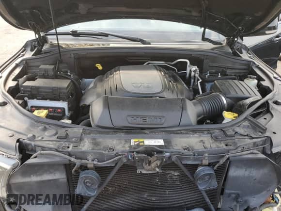 2013 Dodge Durango R/T with VIN 1C4SDJCT7DC696014, listed as a Copart auction lot 65469375 with 123,656 mi miles and Salvage title. Bid and sale history available at DreamBid. Image 12.