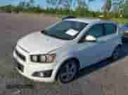 2014 Chevrolet Sonic LTZ with VIN 1G1JE6SB7E4186829, listed as a IAAI auction lot 43152587 with 100,844 mi miles and . Bid and sale history available at DreamBid. Image 2.