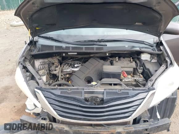 2012 Toyota Sienna with VIN 5TDKA3DC9CS013553, listed as a IAAI auction lot 42096137 with 181,993 mi miles and . Bid and sale history available at DreamBid. Image 10.