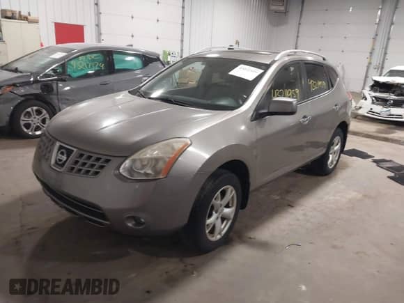 2010 Nissan Rogue S with VIN JN8AS5MV6AW142826, listed as a IAAI auction lot 43211959 with 118,458 mi miles and . Bid and sale history available at DreamBid. Image 17.