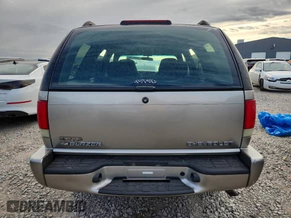 2003 Chevrolet Blazer LS with VIN 1GNDT13XX3K117804, listed as a Copart auction lot 80397155 with 139,797 mi miles and Salvage title. Bid and sale history available at DreamBid. Image 6.