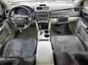 2012 Toyota Camry XLE z VIN 4T1BD1FK5CU054012, wystawiony jako Copart lot #85195425 z przebiegiem 451 292 mil mil oraz Szkoda całkowita • Salvage title. Historia ofert i sprzedaży dostępna na DreamBid. Obrazek 8.