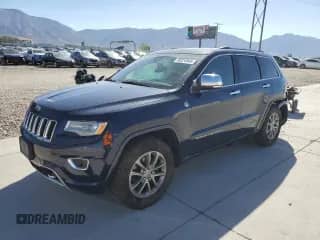 2016 Jeep Grand Cherokee Overland with VIN 1C4RJFCG2GC350920, listed as a Copart auction lot 80224945 with 141,409 mi miles and Salvage title. Bid and sale history available at DreamBid. Image 1.