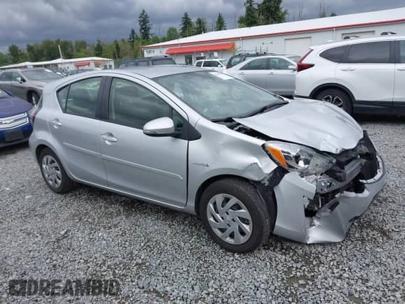 2015 Toyota Prius One z VIN JTDKDTB37F1098842, wystawiony jako IAAI lot #42599025 z przebiegiem 87 264 mil mil oraz . Historia ofert i sprzedaży dostępna na DreamBid. Obrazek 14.