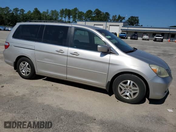 2005 Honda Odyssey EX z VIN 5FNRL38405B418106, wystawiony jako Copart lot #69424465 z przebiegiem 186 798 mil mil oraz Szkoda całkowita • Salvage title. Historia ofert i sprzedaży dostępna na DreamBid. Obrazek 4.
