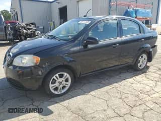 2011 Chevrolet Aveo 1LT with VIN KL1TD5DE6BB212954, listed as a Copart auction lot 69777165 with 33,543 mi miles and Salvage title. Bid and sale history available at DreamBid. Image 1.