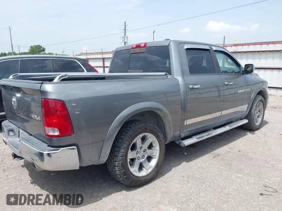 2012 Ram 1500 Laramie with VIN 1C6RD7NT3CS109608, listed as a IAAI auction lot 42639790 with 188,094 mi miles and . Bid and sale history available at DreamBid. Image 4.