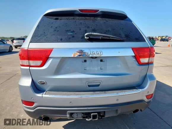 2012 Jeep Grand Cherokee Overland с VIN 1C4RJECT0CC317030, выставлен на аукционе Copart как лот 60969715 с пробегом 160 876 миль миль и Чистый • Clean title. История ставок и продаж доступна на DreamBid. Изображение 6.