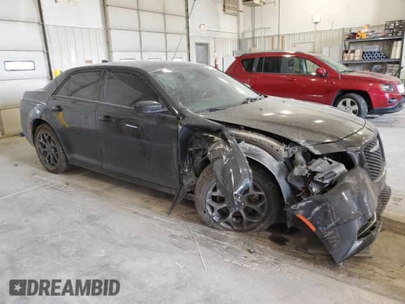 2015 Chrysler 300 S with VIN 2C3CCAGG9FH808630, listed as a Copart auction lot 80619665 with 117,942 mi miles and Salvage title. Bid and sale history available at DreamBid. Image 4.