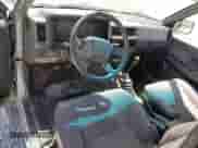 1993 Nissan Frontier SE с VIN 1N6HD16Y9PC430786, выставлен на аукционе Copart как лот 56333545 с пробегом 262 505 миль миль и Списание • Salvage title. История ставок и продаж доступна на DreamBid. Изображение 8.