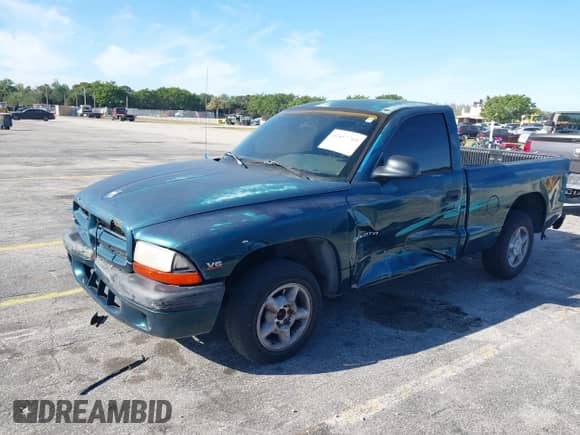 1998 Dodge Dakota SLT z VIN 1B7FL26X2WS685844, wystawiony jako IAAI lot #41857719 z przebiegiem Nie podano mil oraz . Historia ofert i sprzedaży dostępna na DreamBid. Obrazek 19.