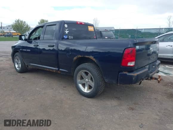 2012 Ram 1500 Express z VIN 1C6RD7FT0CS345213, wystawiony jako IAAI lot #42149548 z przebiegiem 155 464 mil mil oraz . Historia ofert i sprzedaży dostępna na DreamBid. Obrazek 3.